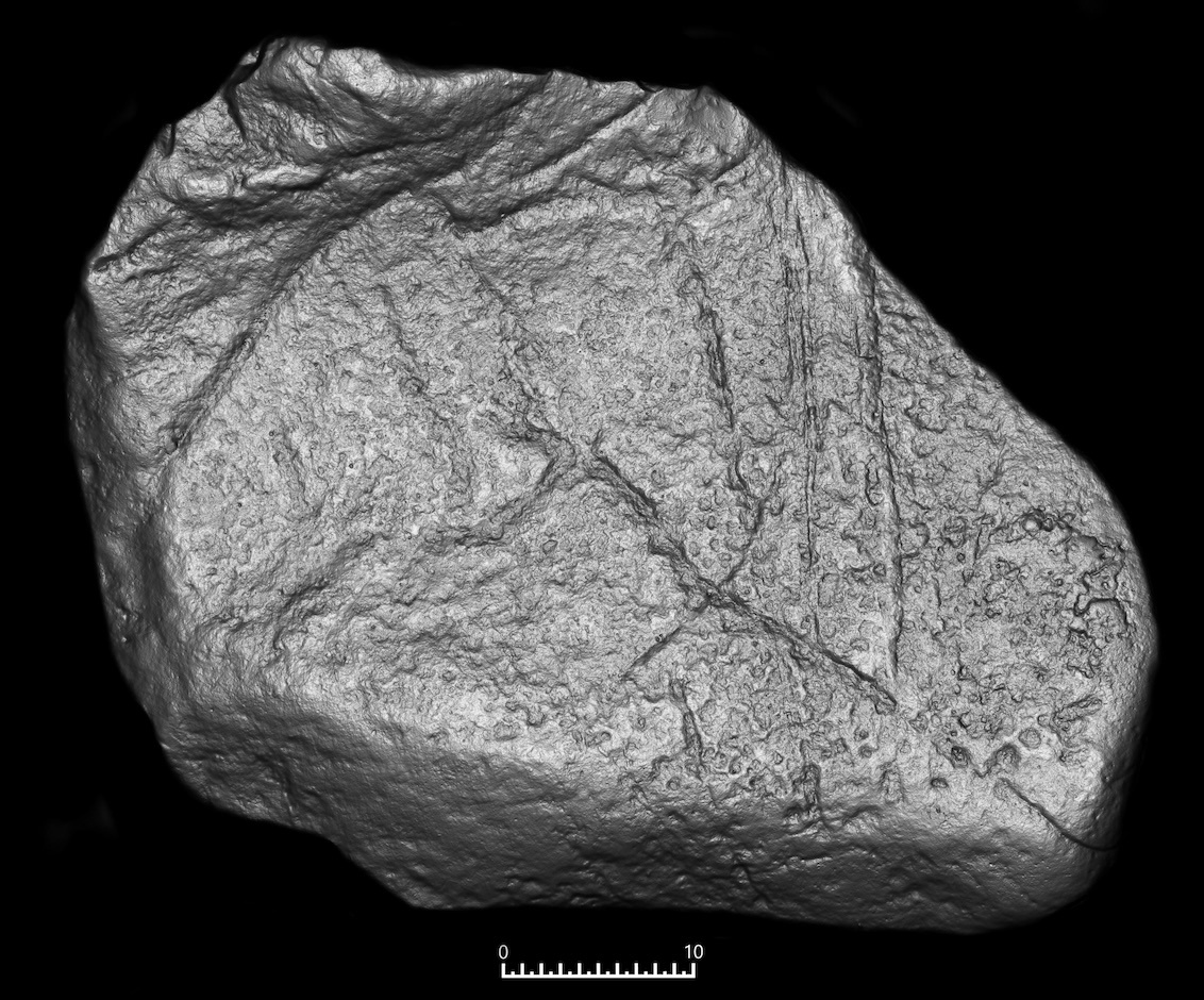 Foto: Langley, M.C., Škrdla, P., Kmošek, M. et al. Engraved Limestone Block from Švédův stůl Cave, Czech Republic, 2026